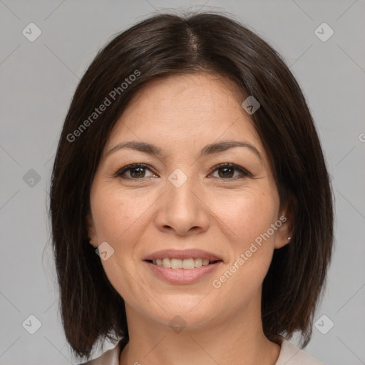 Joyful white adult female with medium  brown hair and brown eyes