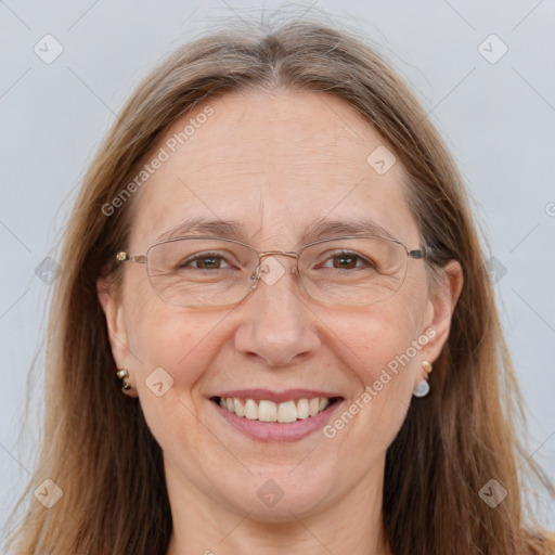 Joyful white adult female with long  brown hair and brown eyes