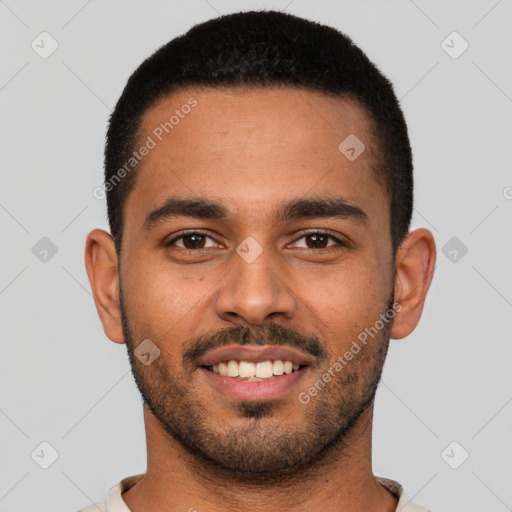 Joyful latino young-adult male with short  brown hair and brown eyes