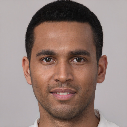 Neutral white young-adult male with short  brown hair and brown eyes