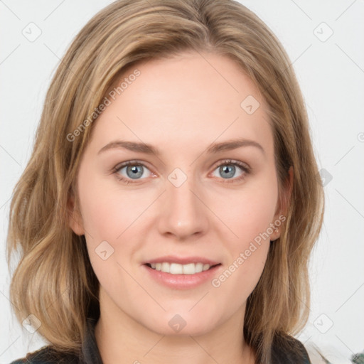 Joyful white young-adult female with medium  brown hair and blue eyes