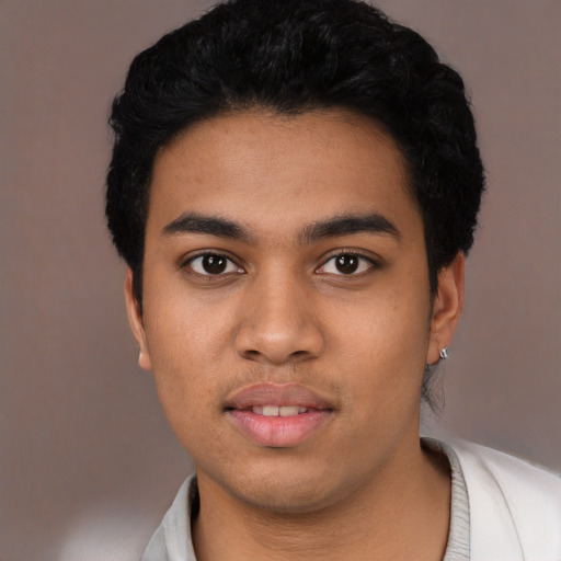 Neutral latino young-adult male with short  black hair and brown eyes