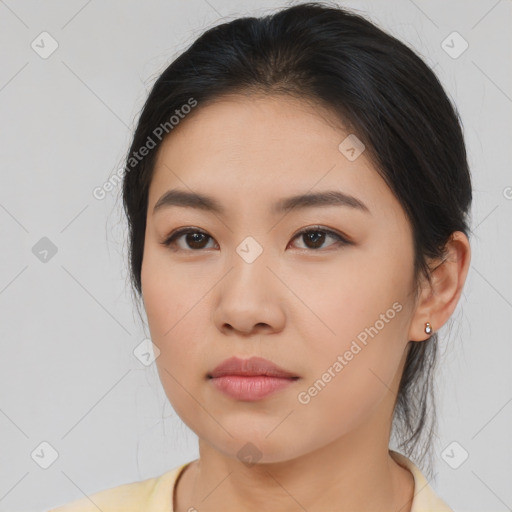 Neutral asian young-adult female with medium  brown hair and brown eyes