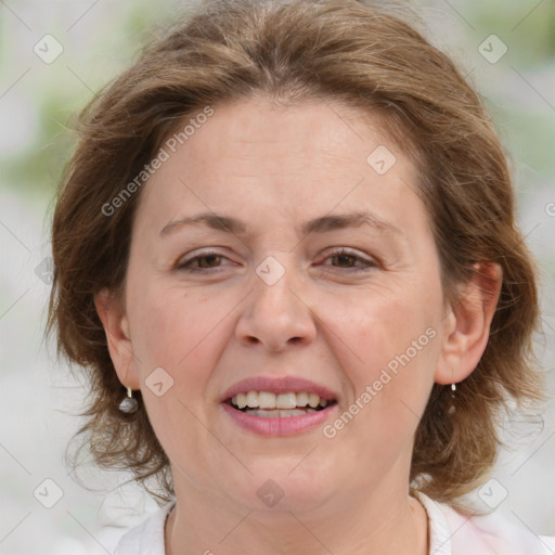 Joyful white adult female with medium  brown hair and grey eyes