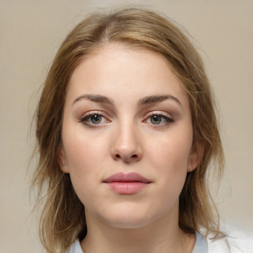 Neutral white young-adult female with medium  brown hair and green eyes