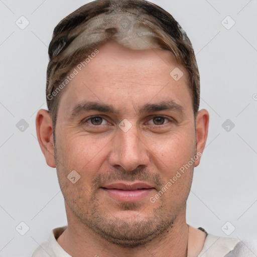 Joyful white adult male with short  brown hair and grey eyes