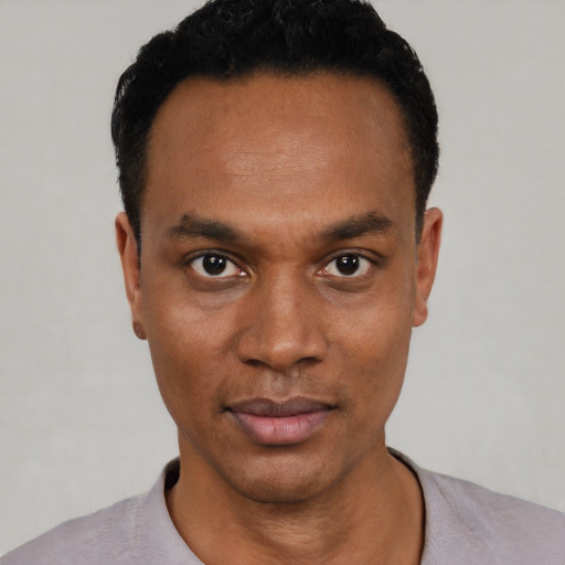 Neutral black young-adult male with short  black hair and brown eyes