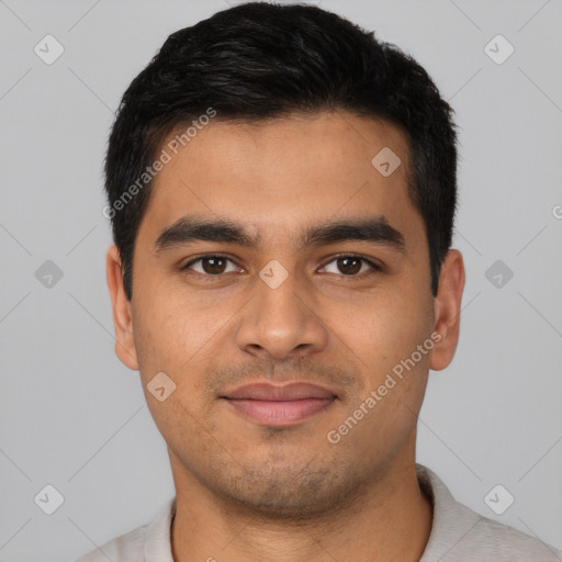 Joyful latino young-adult male with short  black hair and brown eyes