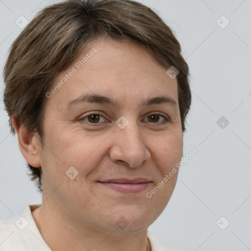 Joyful white adult female with short  brown hair and brown eyes