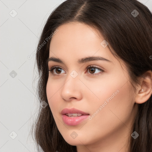 Neutral white young-adult female with long  brown hair and brown eyes