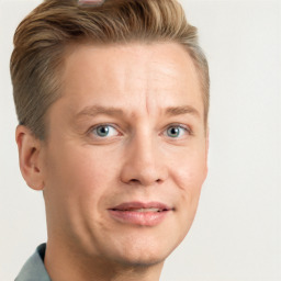 Joyful white adult male with short  brown hair and grey eyes