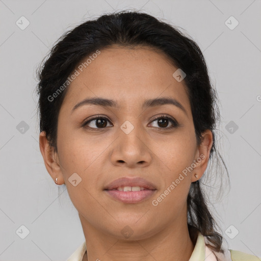 Joyful latino young-adult female with short  brown hair and brown eyes