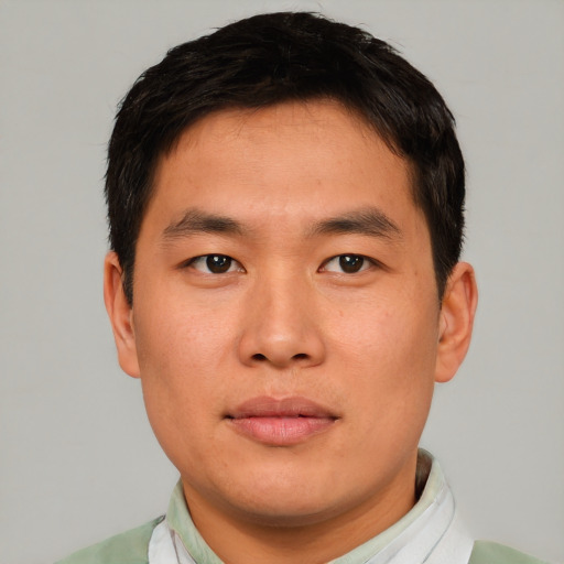 Neutral asian young-adult male with short  brown hair and brown eyes