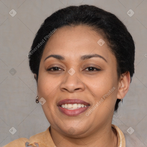 Joyful latino adult female with short  brown hair and brown eyes