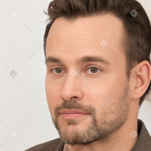 Neutral white adult male with short  brown hair and brown eyes