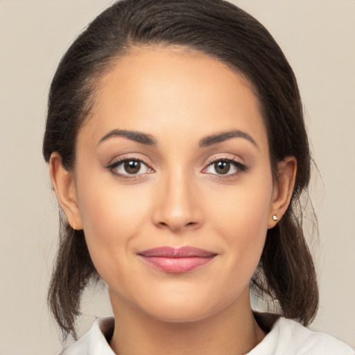 Joyful white young-adult female with medium  brown hair and brown eyes