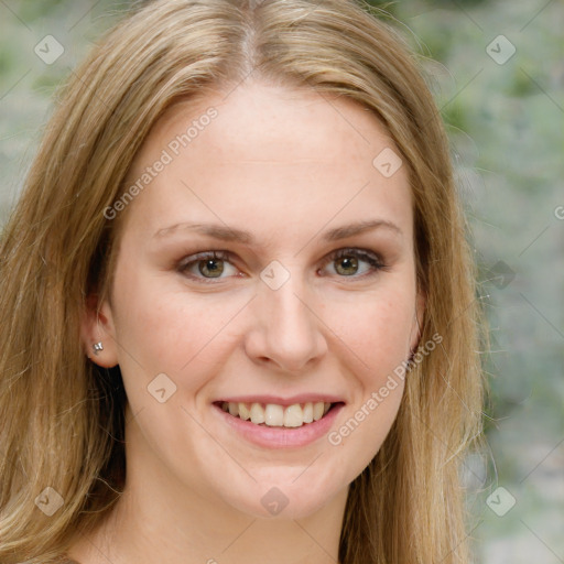 Joyful white young-adult female with long  brown hair and green eyes