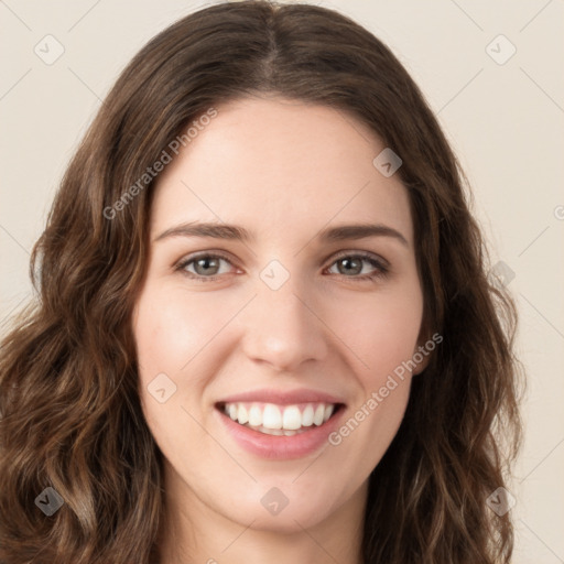 Joyful white young-adult female with long  brown hair and green eyes