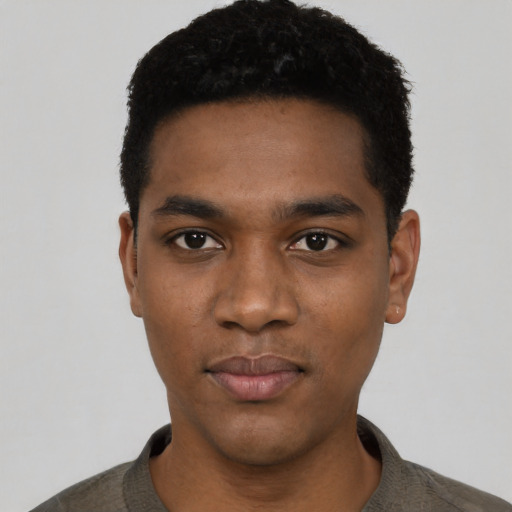 Neutral black young-adult male with short  black hair and brown eyes