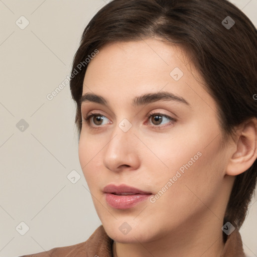 Neutral white young-adult female with medium  brown hair and brown eyes