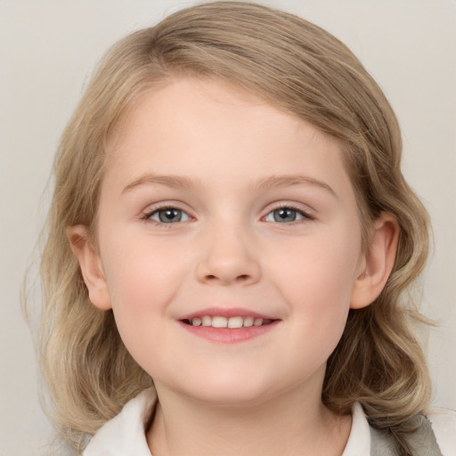 Joyful white child female with medium  brown hair and grey eyes