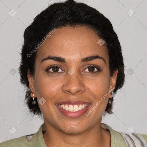 Joyful latino young-adult female with medium  brown hair and brown eyes