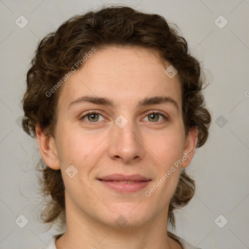 Joyful white young-adult female with medium  brown hair and green eyes