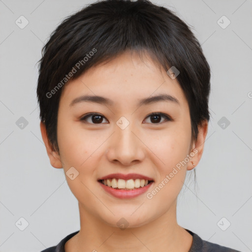 Joyful asian young-adult female with short  brown hair and brown eyes