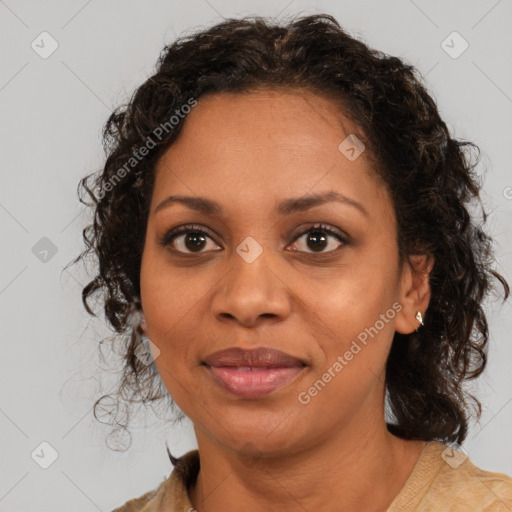 Joyful black young-adult female with medium  brown hair and brown eyes