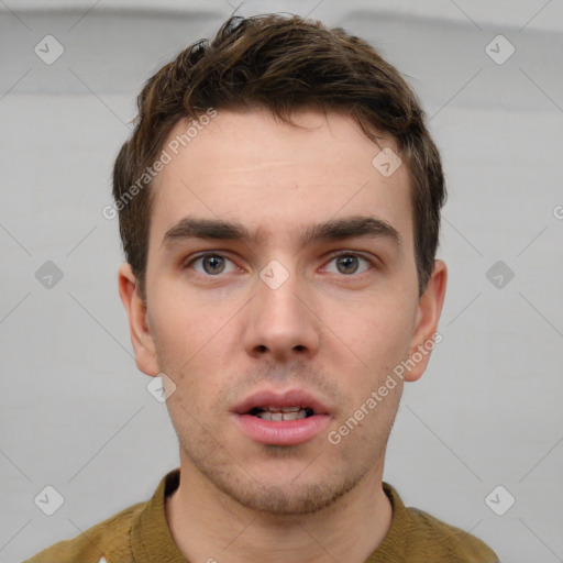 Neutral white young-adult male with short  brown hair and brown eyes