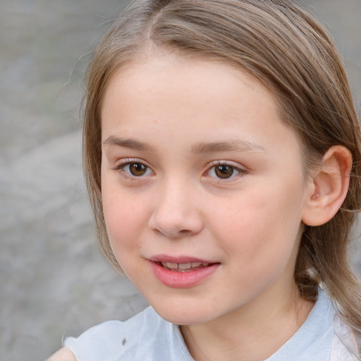 Joyful white child female with medium  brown hair and brown eyes