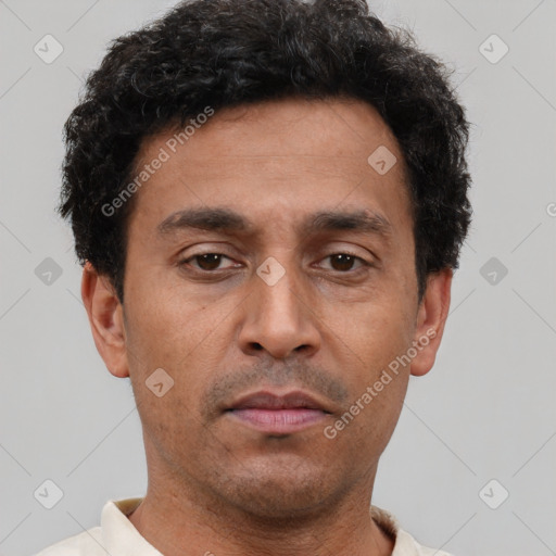 Neutral latino young-adult male with short  brown hair and brown eyes