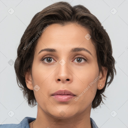 Neutral white young-adult female with medium  brown hair and brown eyes