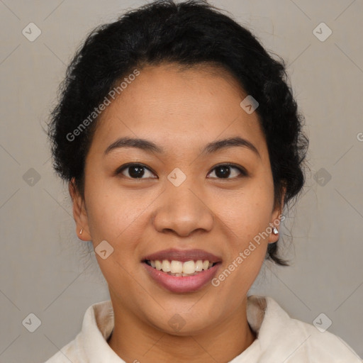 Joyful latino young-adult female with short  brown hair and brown eyes