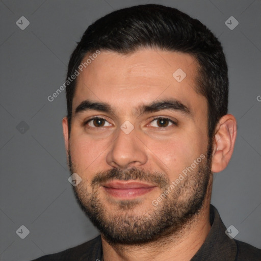 Joyful white young-adult male with short  black hair and brown eyes