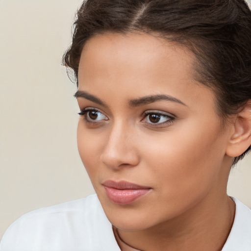 Neutral white young-adult female with short  brown hair and brown eyes