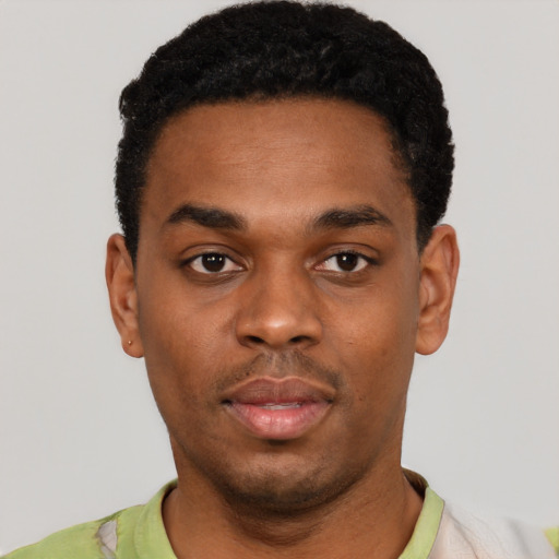 Neutral black young-adult male with short  black hair and brown eyes