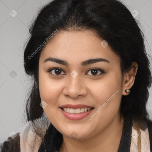 Joyful latino young-adult female with long  brown hair and brown eyes