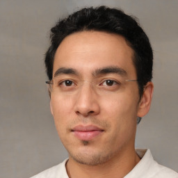 Neutral white young-adult male with short  black hair and brown eyes