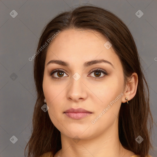 Neutral white young-adult female with long  brown hair and brown eyes