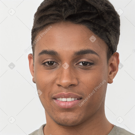 Joyful black young-adult male with short  brown hair and brown eyes