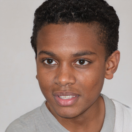 Joyful black young-adult male with short  brown hair and brown eyes