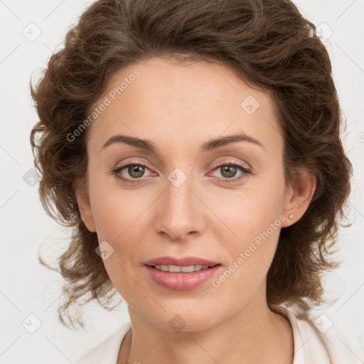 Joyful white young-adult female with medium  brown hair and green eyes