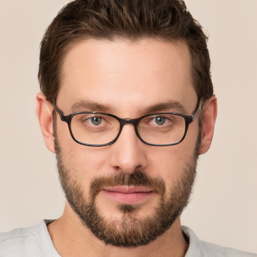 Neutral white young-adult male with short  brown hair and grey eyes