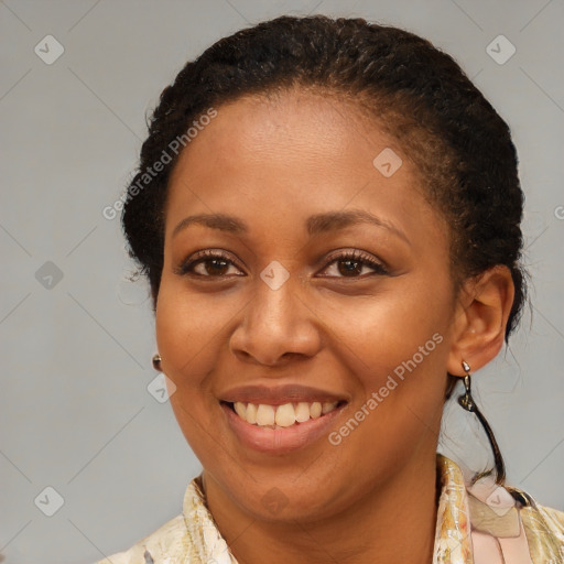 Joyful latino adult female with short  brown hair and brown eyes