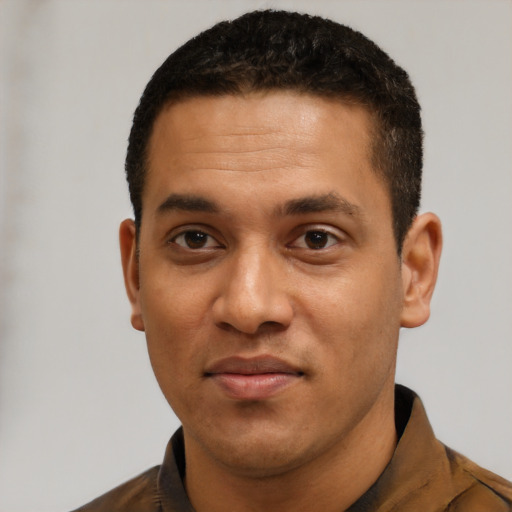 Neutral white young-adult male with short  black hair and brown eyes