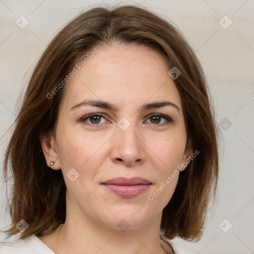 Joyful white young-adult female with medium  brown hair and green eyes