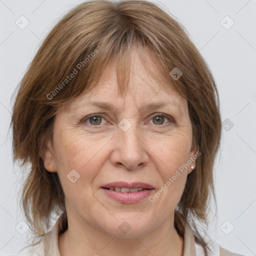 Joyful white adult female with medium  brown hair and grey eyes