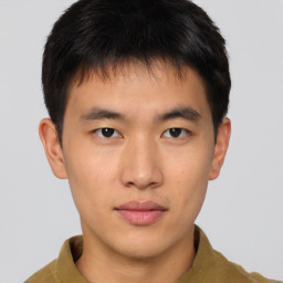 Neutral asian young-adult male with short  brown hair and brown eyes