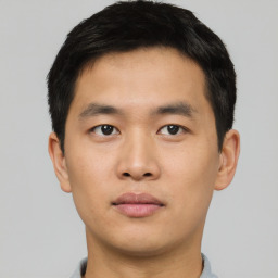 Neutral asian young-adult male with short  black hair and brown eyes